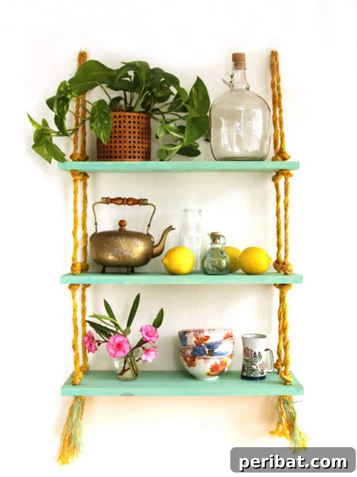 120 Inspiring DIY Boho Decor Ideas and Projects 41 Rustic DIY rope shelf, offering charm and extra storage while empowering with power tool use.