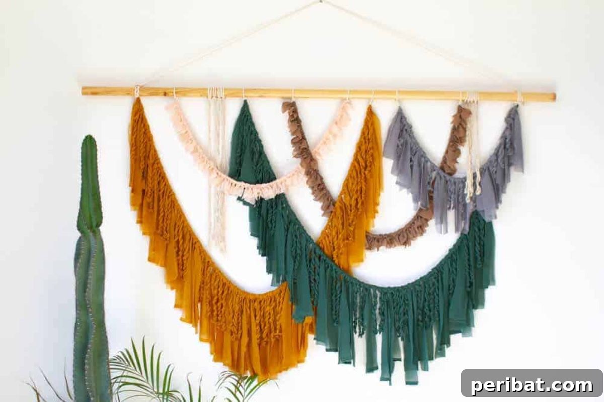 120 Inspiring DIY Boho Decor Ideas and Projects 45 Visually stunning DIY fabric wall hanging for a boho bohemian wedding backdrop, requiring minimal crafting skills.