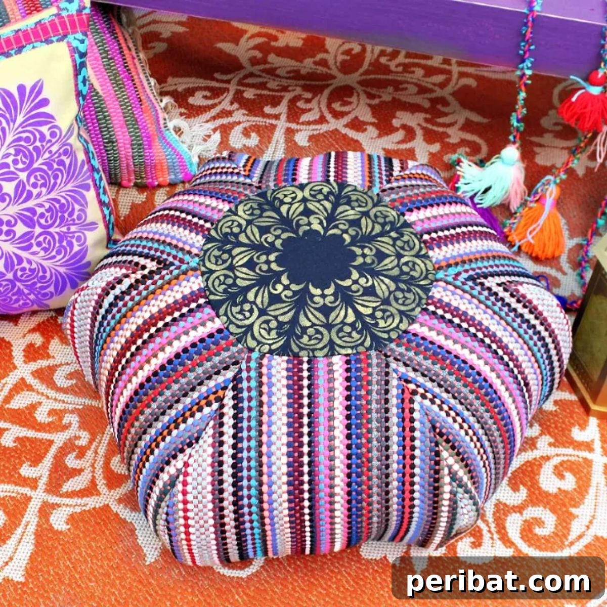120 Inspiring DIY Boho Decor Ideas and Projects 56 Multi-purpose rag rug floor pouf with Moroccan flair, offering extra seating or a footrest.
