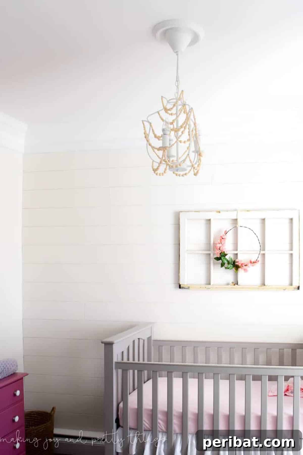 120 Inspiring DIY Boho Decor Ideas and Projects 67 DIY wood bead chandelier, illuminating and elevating your room with rustic elegance and an earthy aesthetic.
