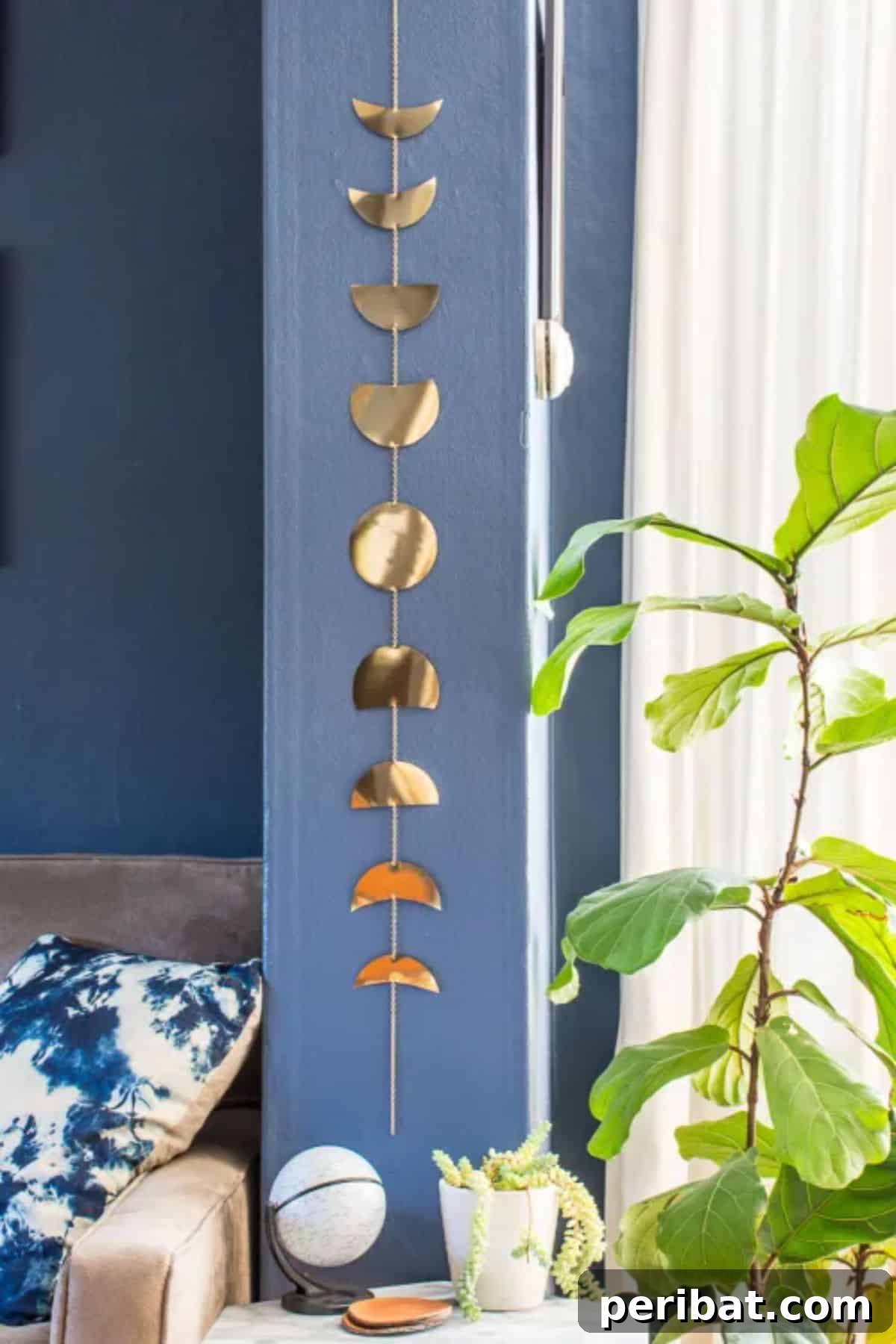 120 Inspiring DIY Boho Decor Ideas and Projects 68 Chic and easy DIY moon phases wall hanging made from gold foil scrapbooking paper, satisfying celestial cravings.