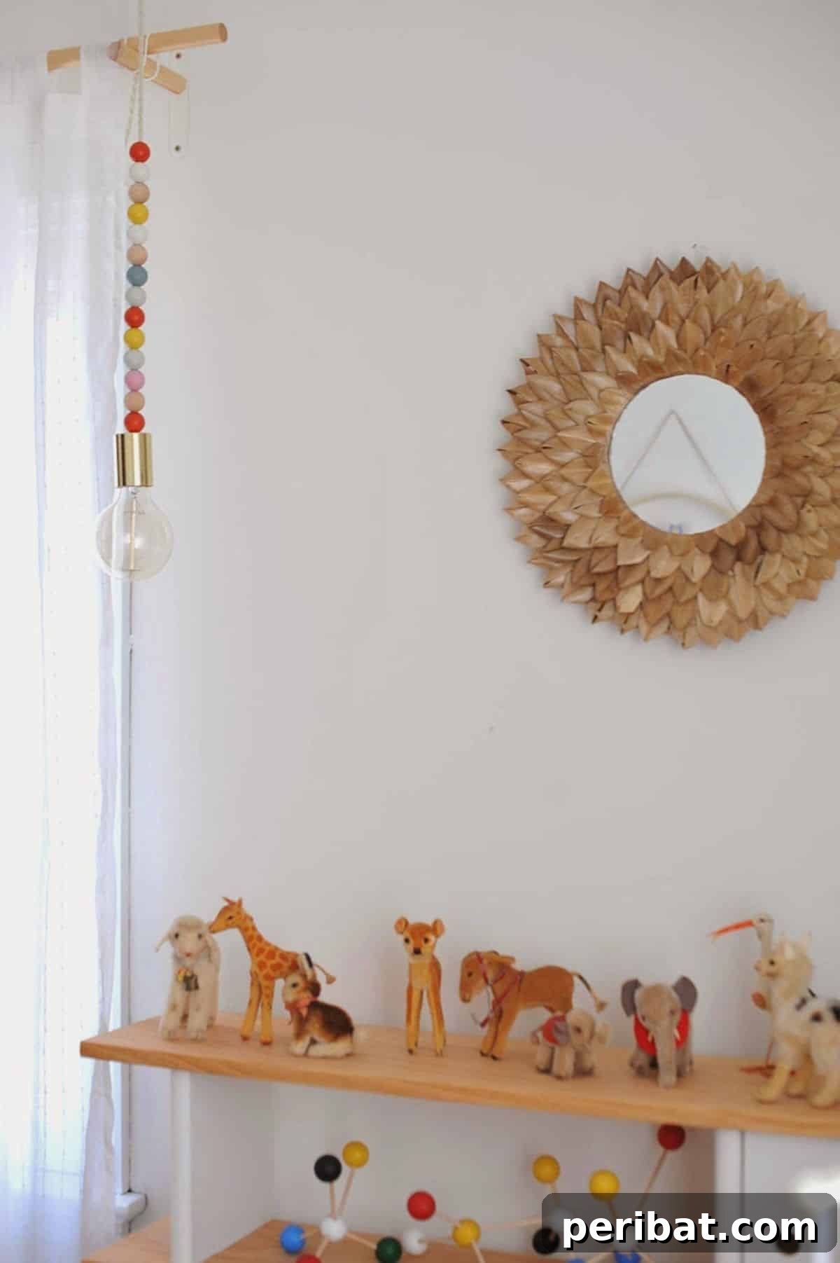 120 Inspiring DIY Boho Decor Ideas and Projects 74 Modern yet playful DIY wooden bead pendant light, a stylish and functional addition for a nursery.