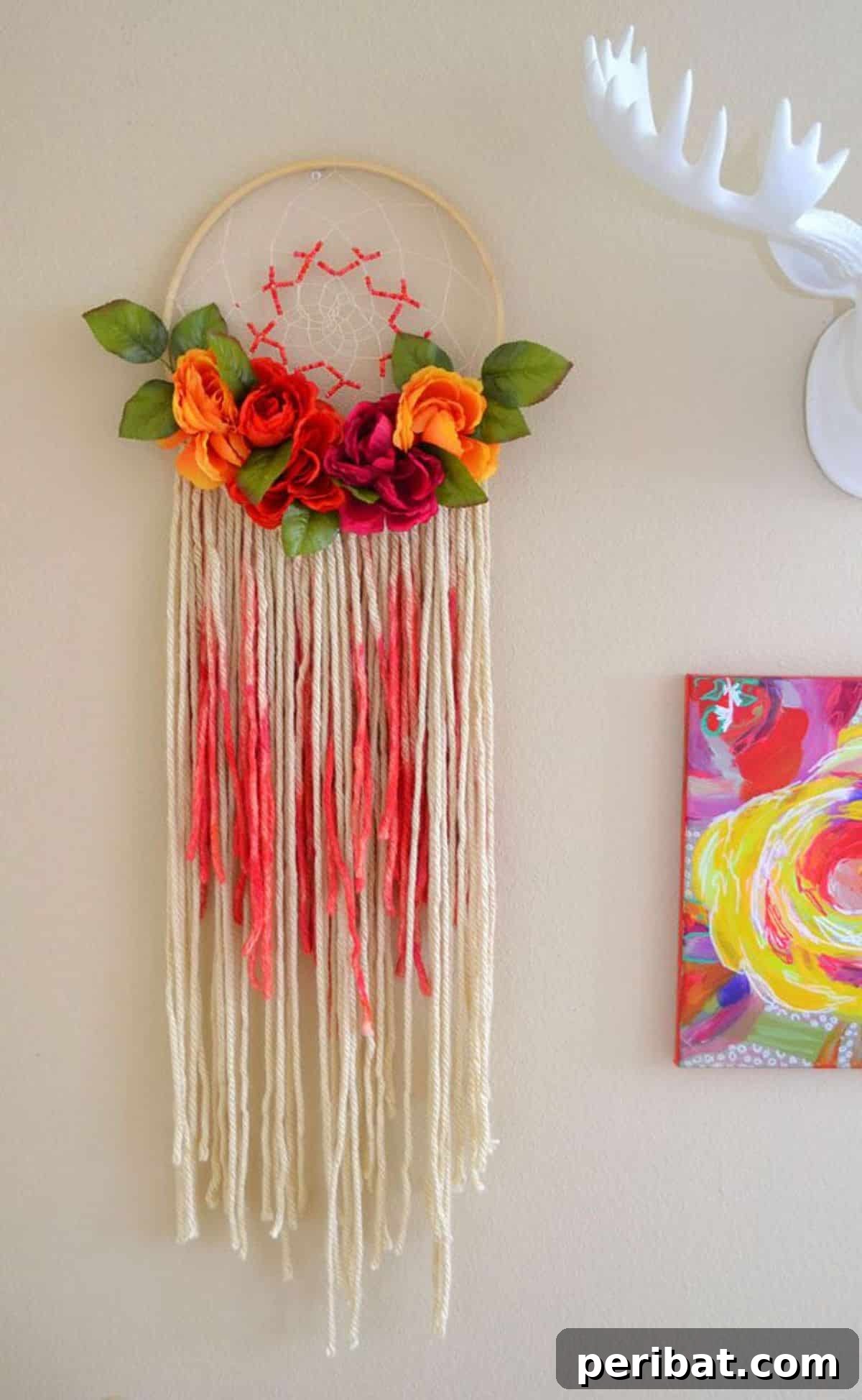 120 Inspiring DIY Boho Decor Ideas and Projects 75 Whimsical DIY floral dreamcatcher, transforming a blank wall into a vertical canvas of creativity and bohemian appeal.