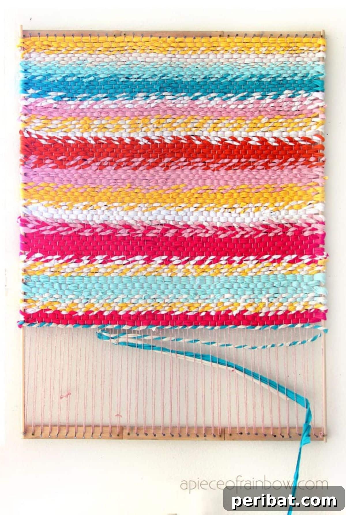 120 Inspiring DIY Boho Decor Ideas and Projects 94 Artistic boho T-shirt rag rug crafted on a DIY loom, recycling old shirts and bringing unique texture and coziness to floors.