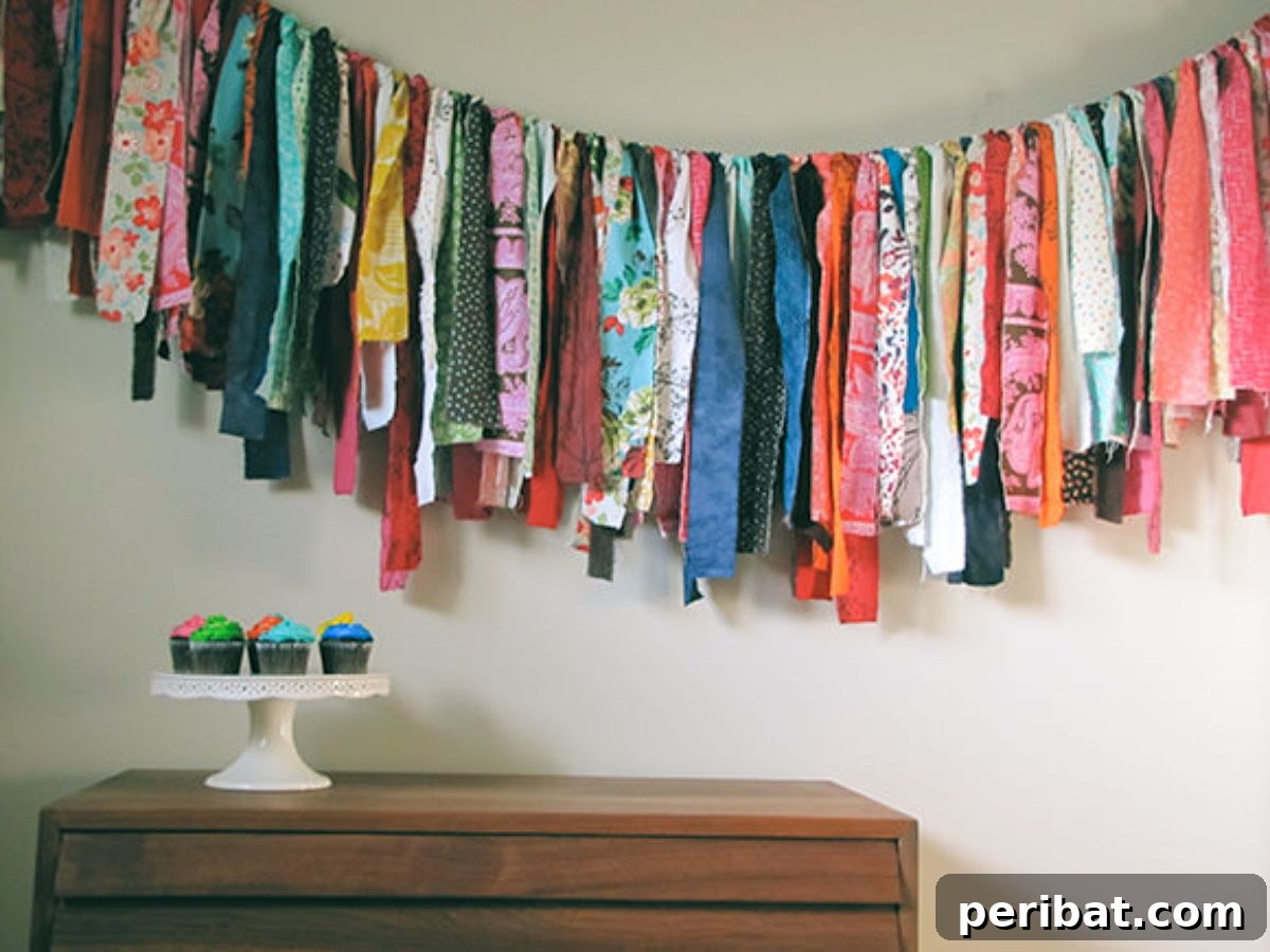 120 Inspiring DIY Boho Decor Ideas and Projects 96 Charming and eco-friendly DIY fabric scrap garland, breathing new life into leftovers for party decor or bedroom sprucing.