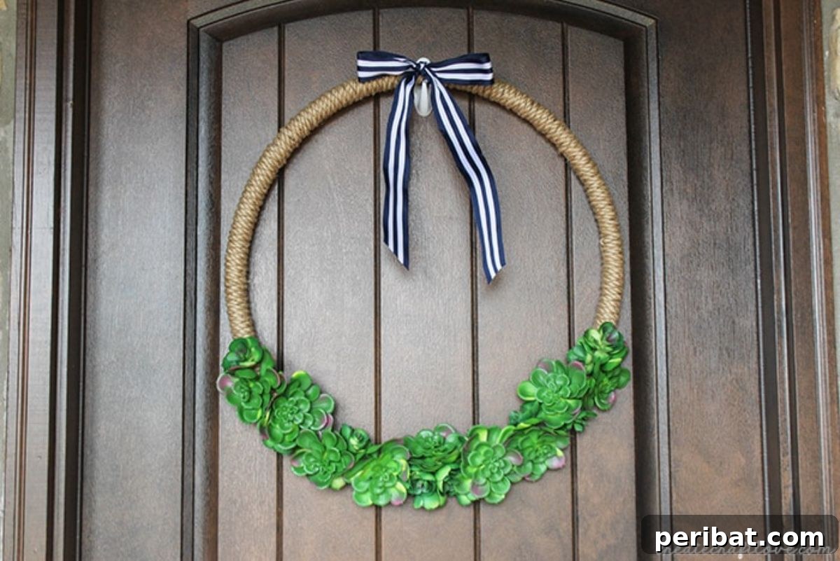 120 Inspiring DIY Boho Decor Ideas and Projects 97 Trendy succulent hoop wreath, blending embroidery hoops and live plants for an easy-to-maintain, fresh, natural look.