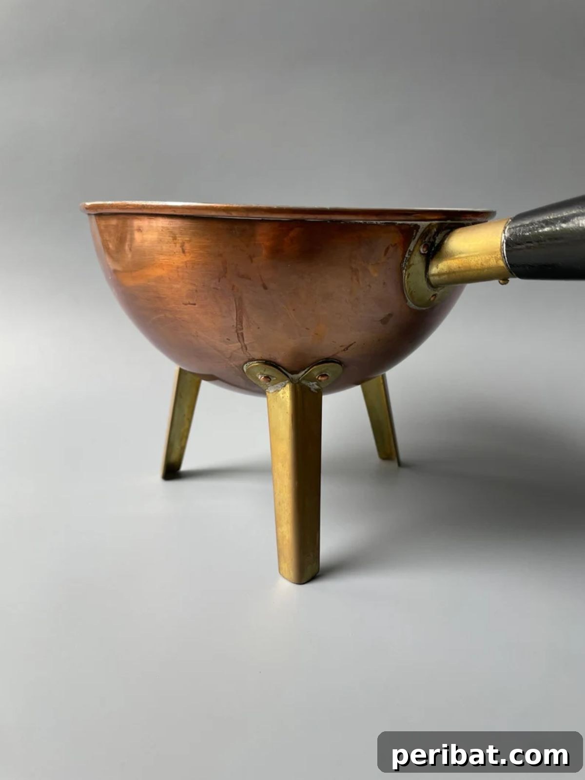 Charming Rustic Kitchens: DIY Decor and Craft Projects 46 Vintage Copper Pot With Wooden Handle