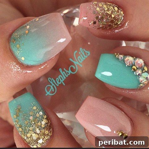 Blue, pink, and gold nails