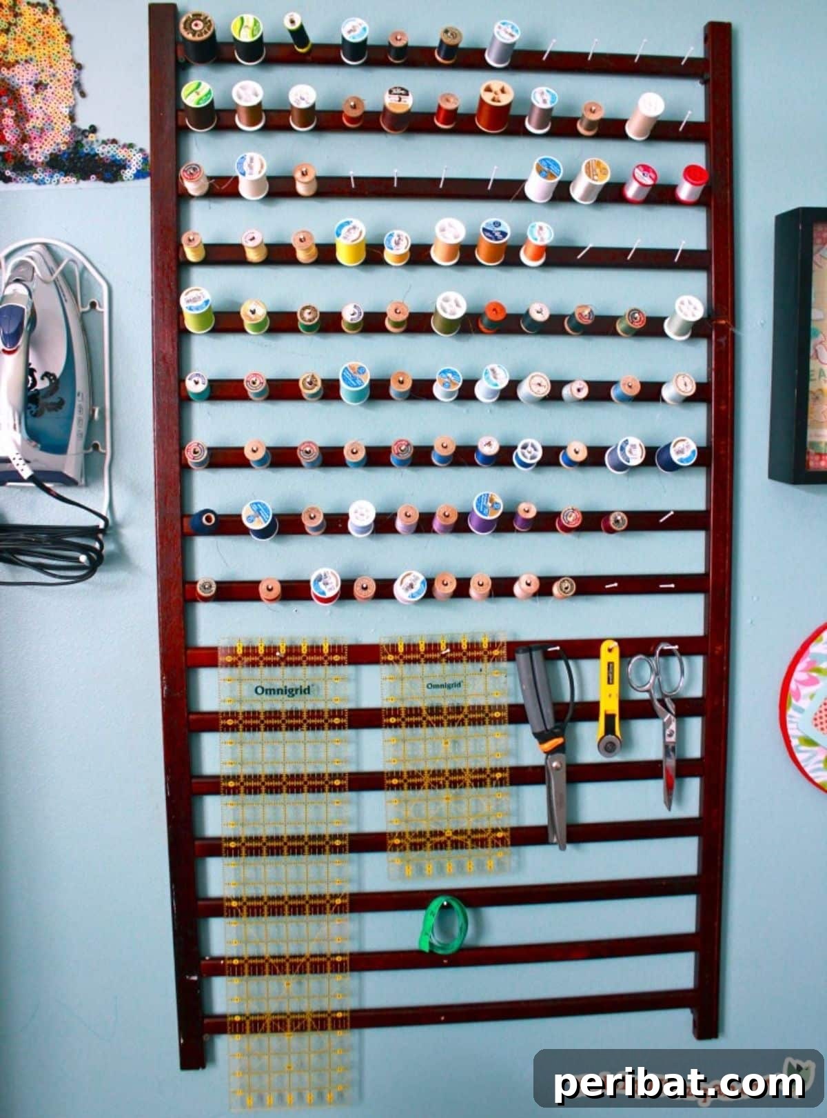 Cribs Reimagined 37 Clever Upcycling Ideas 11 Repurposed crib into a sewing supply organizing rack