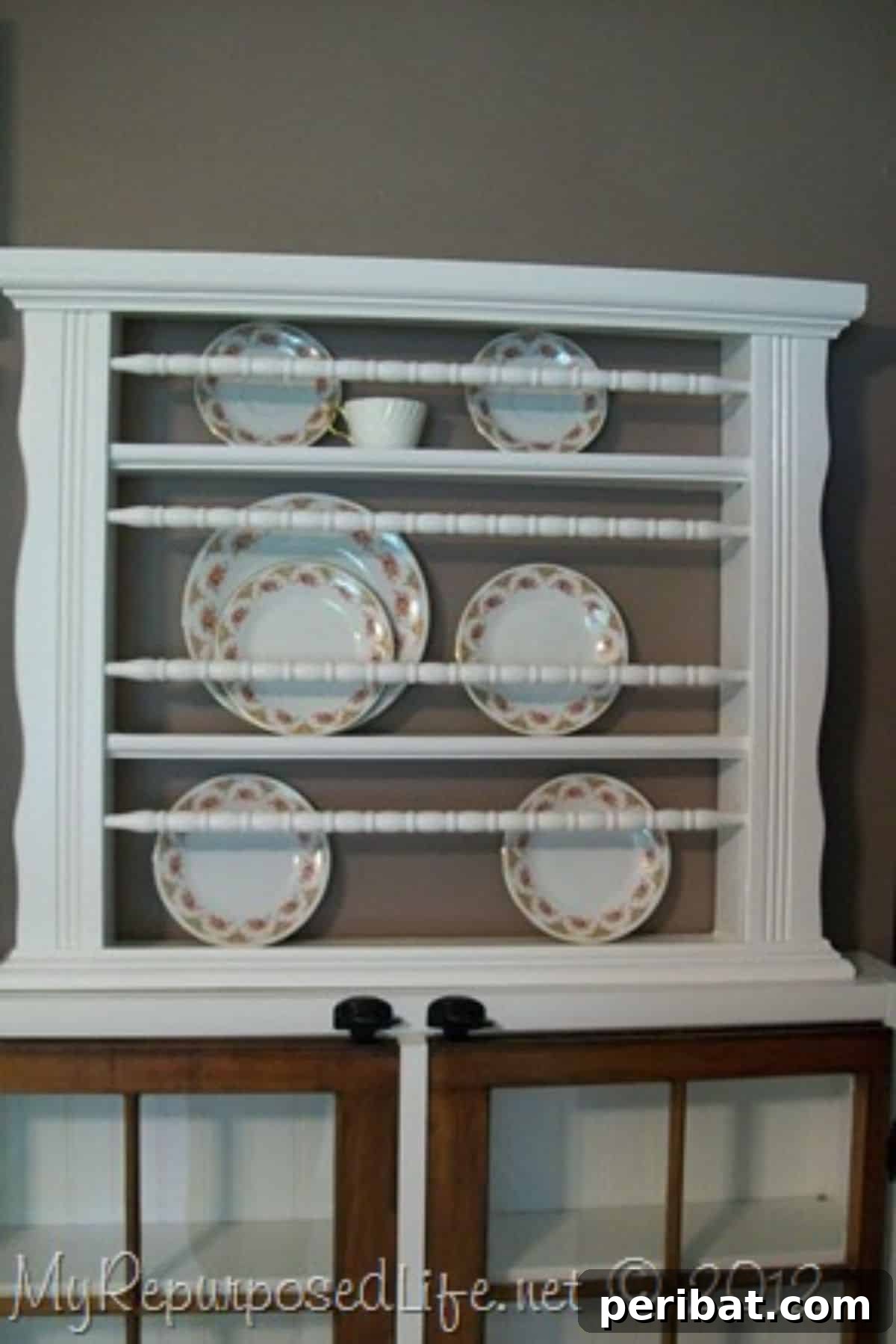 Cribs Reimagined 37 Clever Upcycling Ideas 12 Old crib upcycled into a chic plate display rack