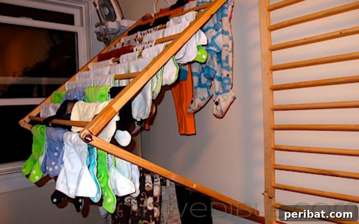 Cribs Reimagined 37 Clever Upcycling Ideas 13 Space-saving wall-mounted clothes drying rack from crib parts