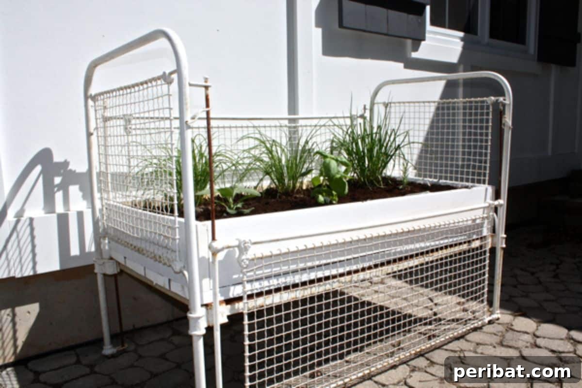 Cribs Reimagined 37 Clever Upcycling Ideas 38 Antique crib converted into a charming herb garden planter