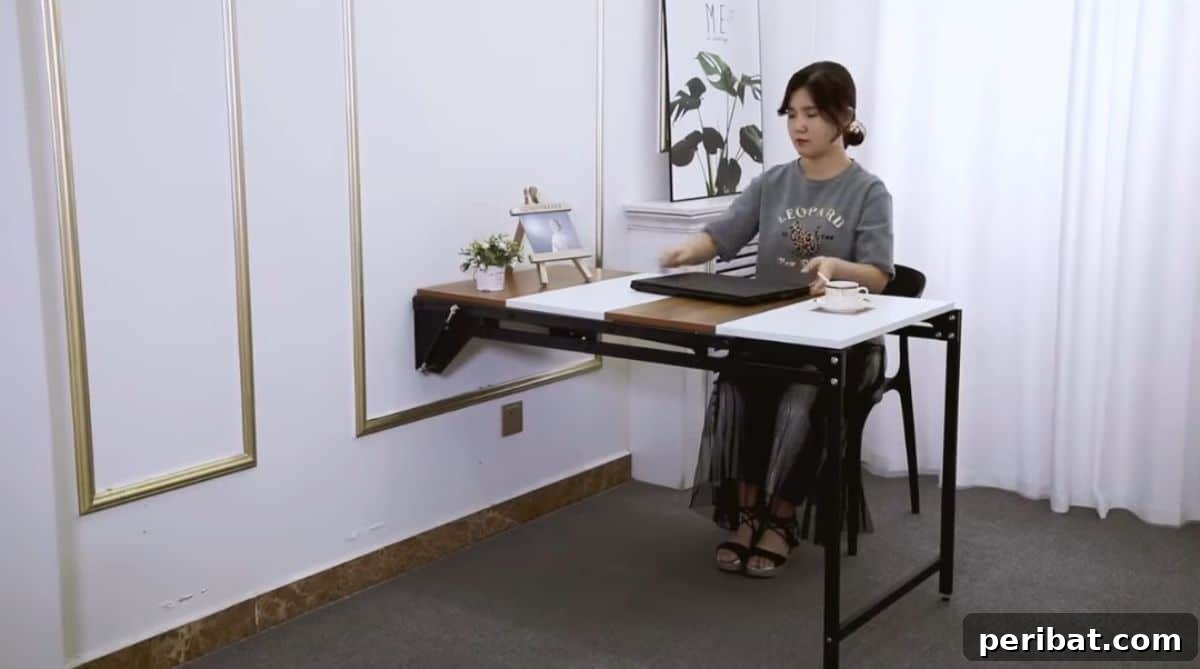 21 Transforming Shelves: Clever Designs for Dynamic Spaces 10 A sleek wall-mounted unit that elegantly transforms from a compact shelf into a functional table, ideal for small spaces.