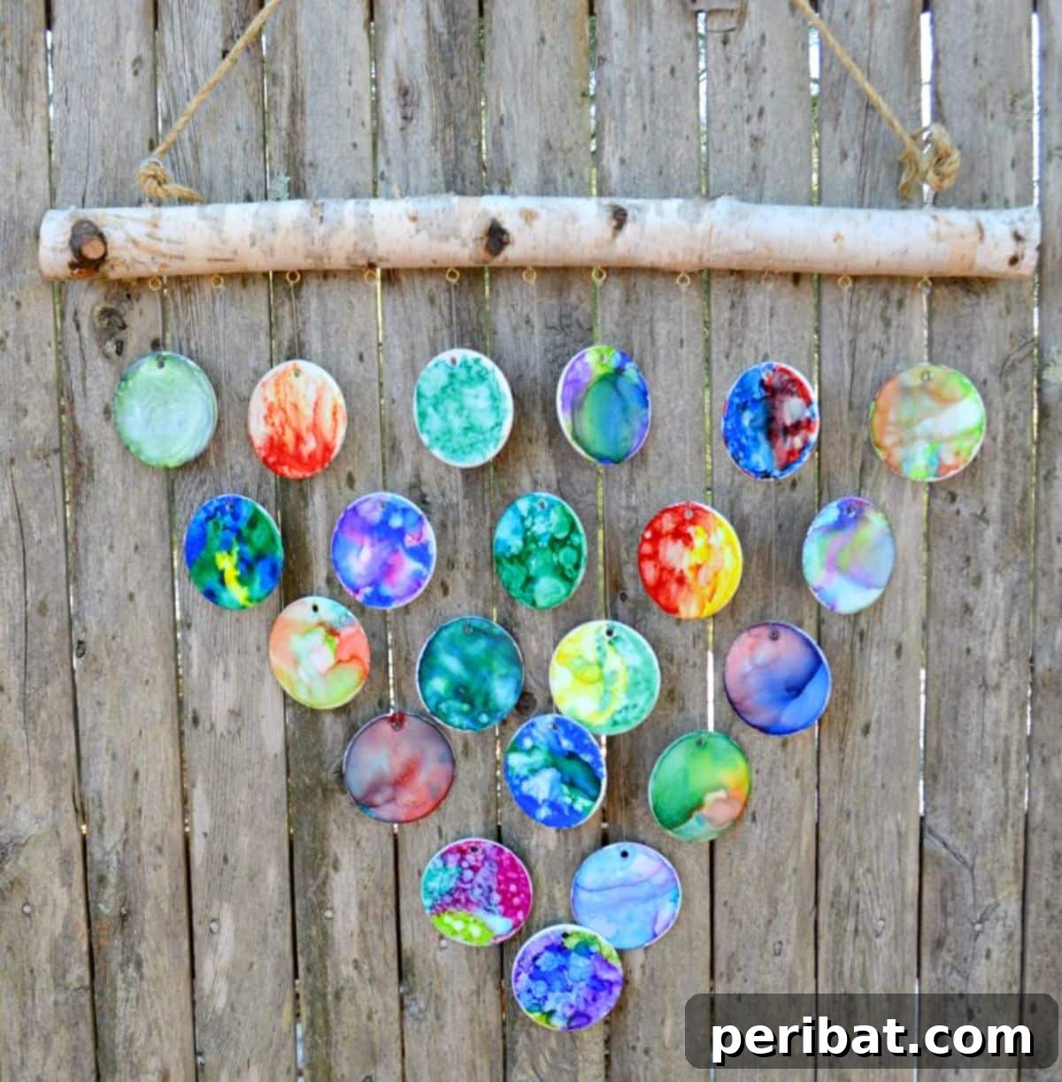 50 Summer DIY Projects to Brighten Your Home 16 DIY Hand-Painted Wind Chimes