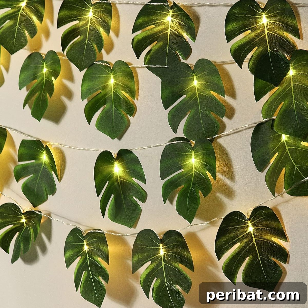 50 Summer DIY Projects to Brighten Your Home 23 Monstera Leaf String Lights