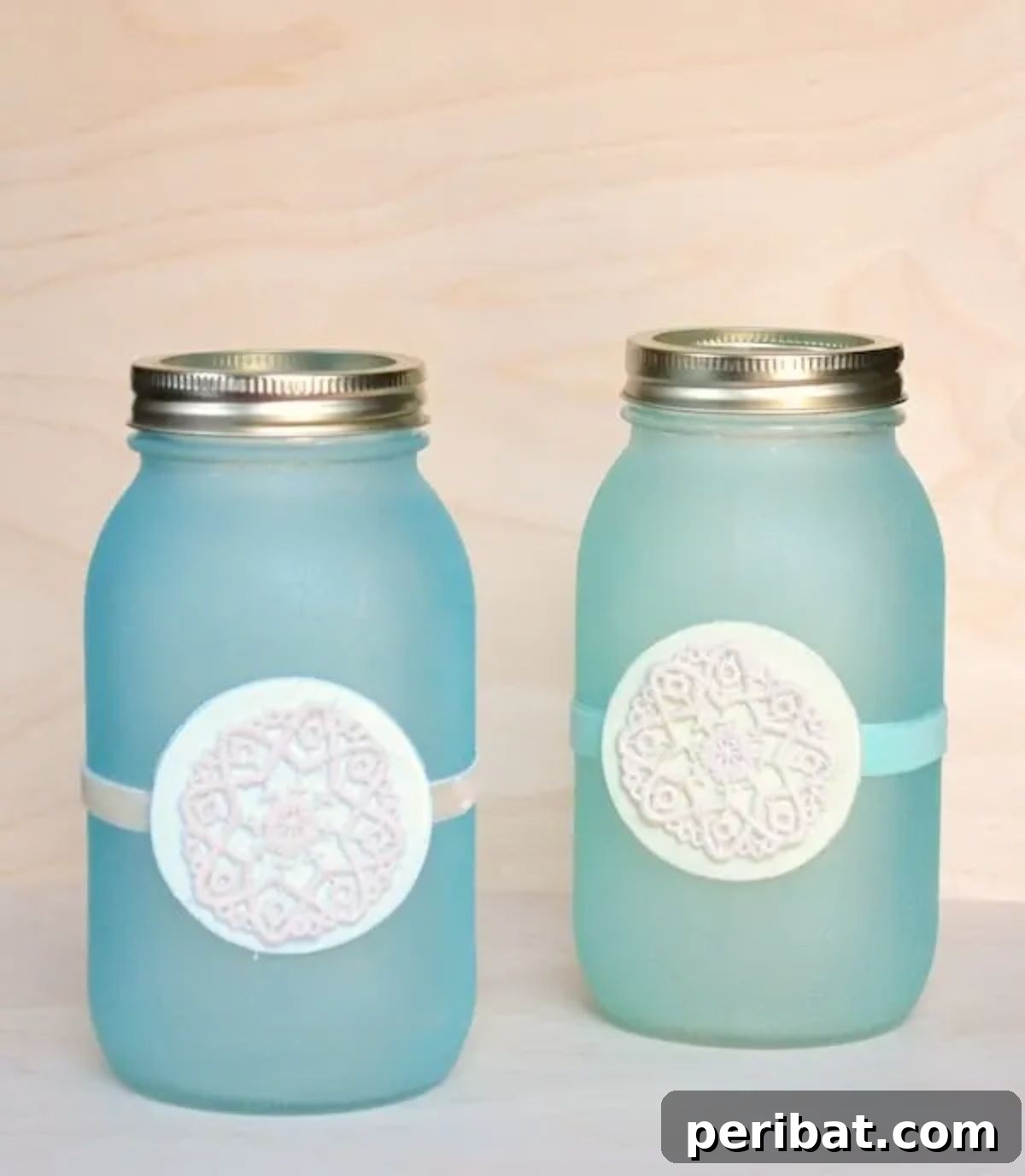 50 Summer DIY Projects to Brighten Your Home 26 Mason Jar Lanterns with a Faux Beach Glass Finish