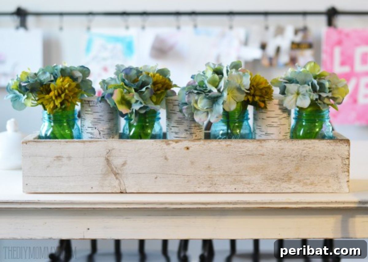 Craft Your Spring: 50 Fresh Home Decor Ideas 33 Rustic Spring Planter Box Centerpiece with Mason Jars & Hydrangeas