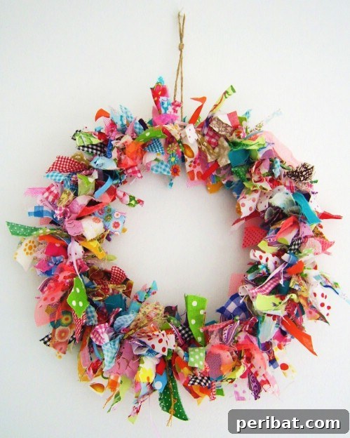 Parça Kumaşlardan Muhteşem Projeler: 100'den Fazla Yaratıcı Değerlendirme Fikri 98 DIY Fabric Scrap Spring Wreath with Pastels