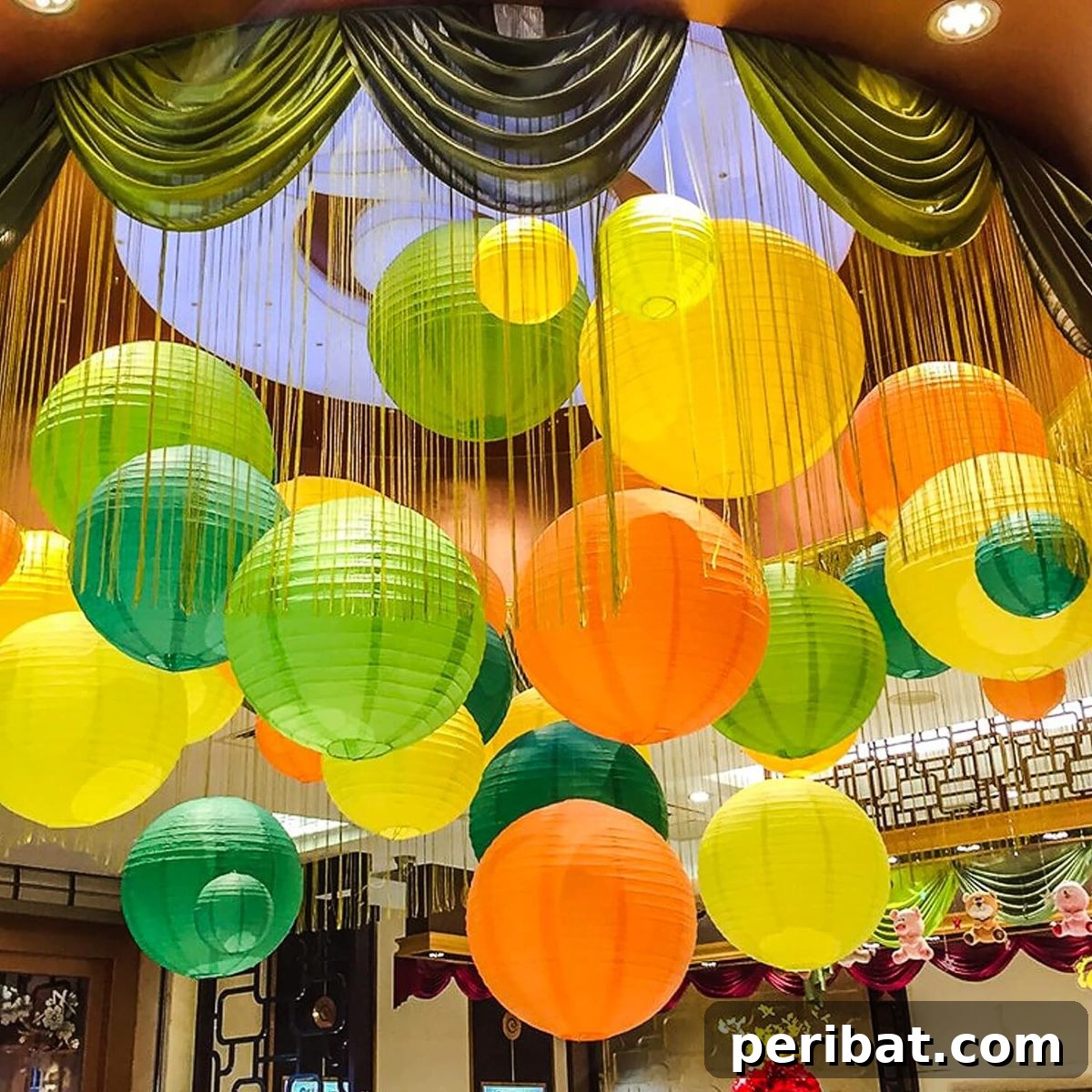 Multicolored round paper lanterns for vibrant birthday party decor inspiration