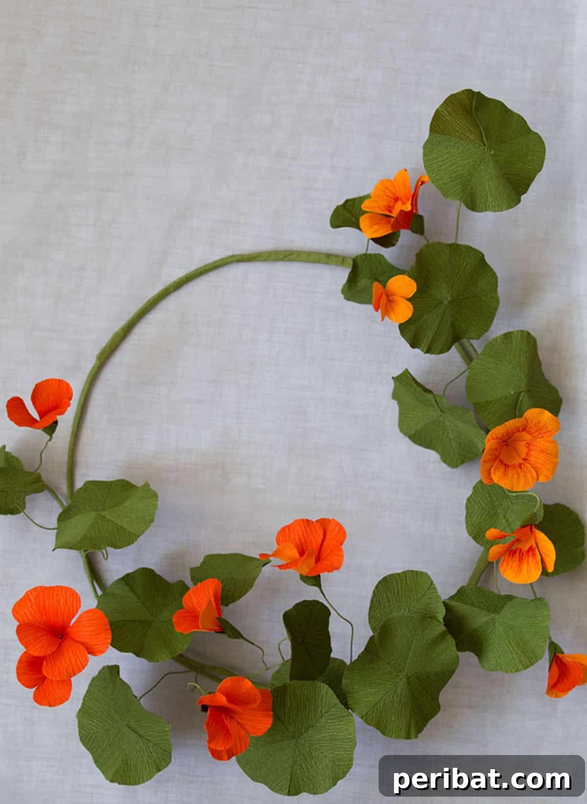Handcrafted DIY paper nasturtium flower wreath for unique birthday decor
