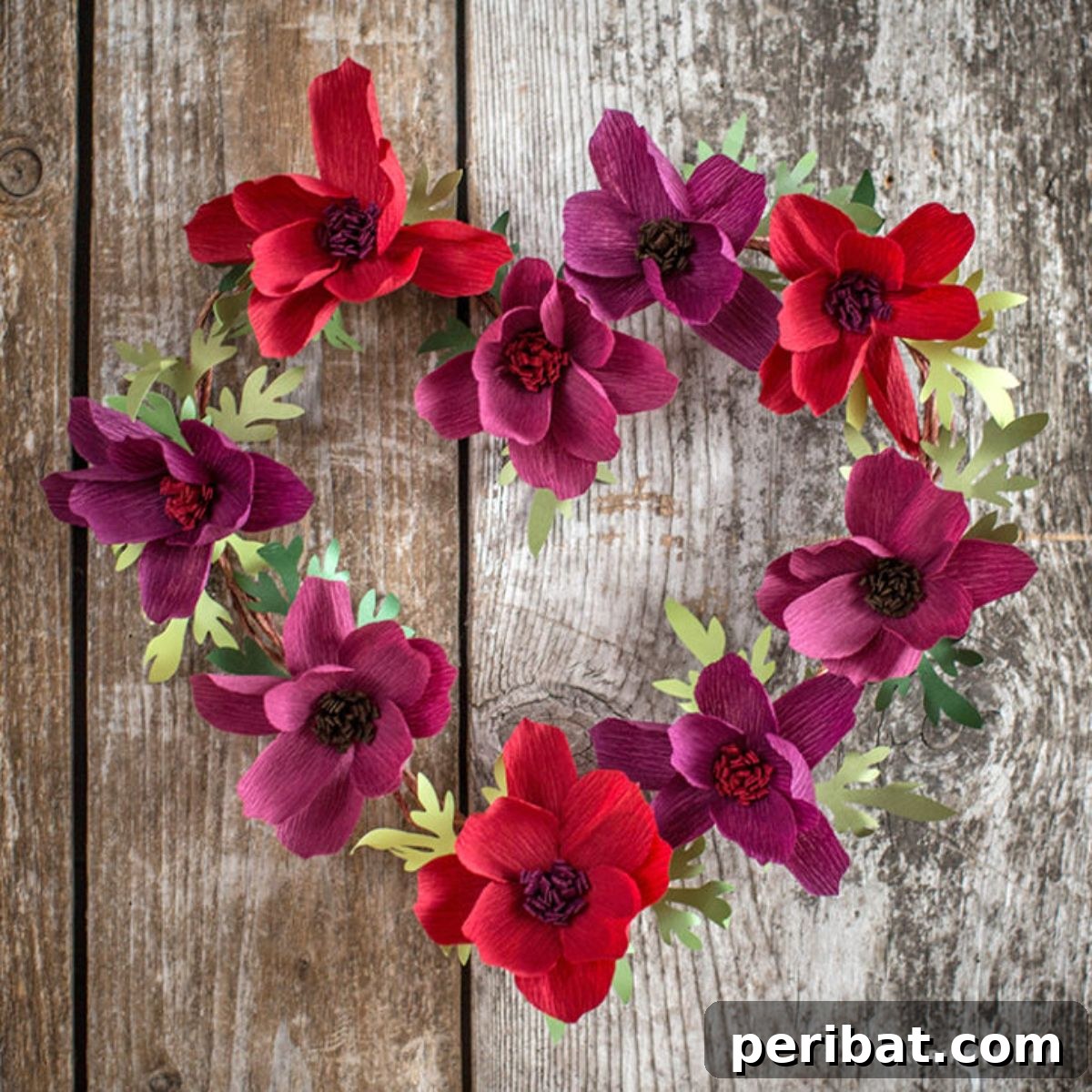 Crafting a captivating cosmos flower heart wreath with crepe paper for birthday decor