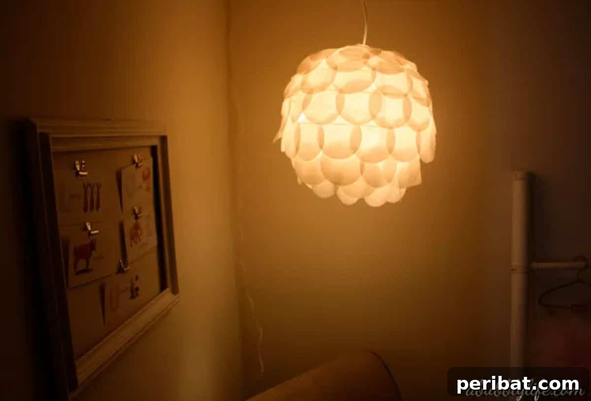 DIY elegant paper lantern from tissue circles for a warm birthday ambiance