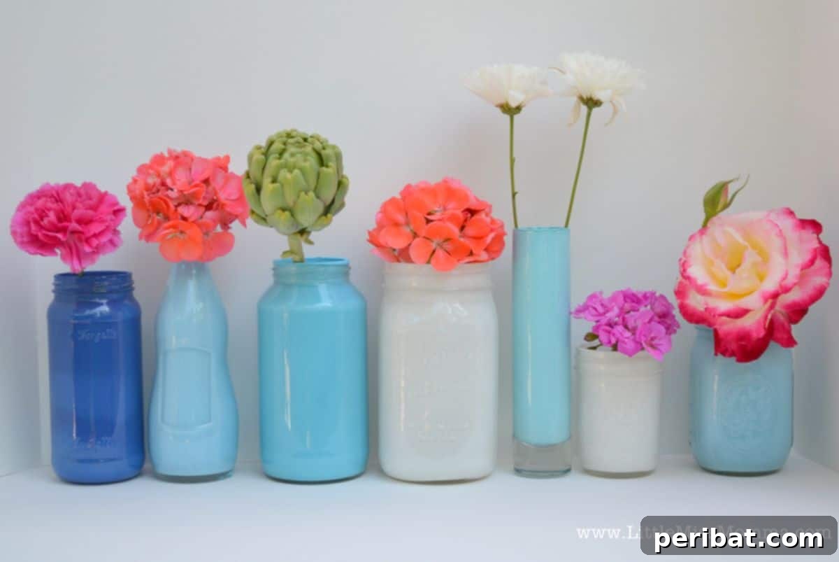 Creating vibrant personalized DIY painted mason jar vases for birthday party decor