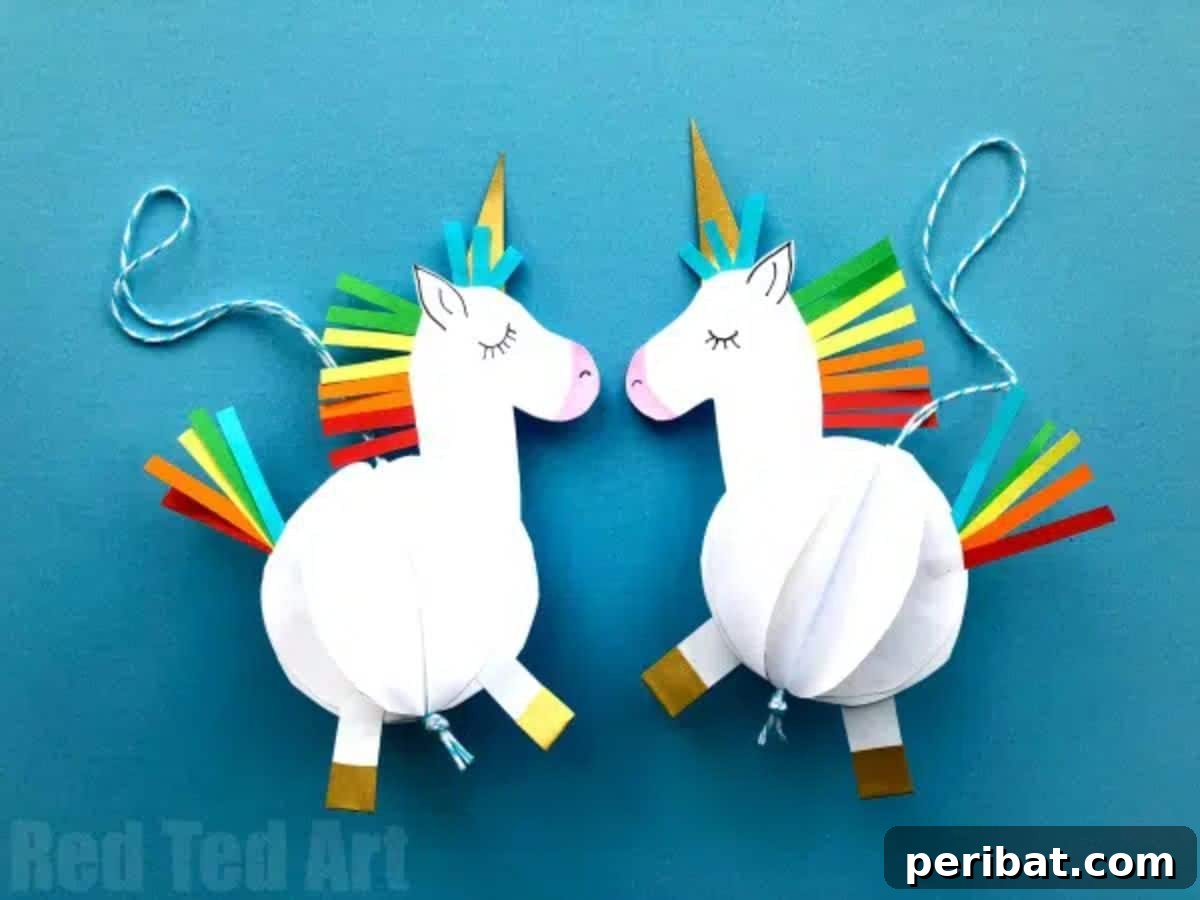 DIY 3D paper unicorn decoration for a magical birthday party theme