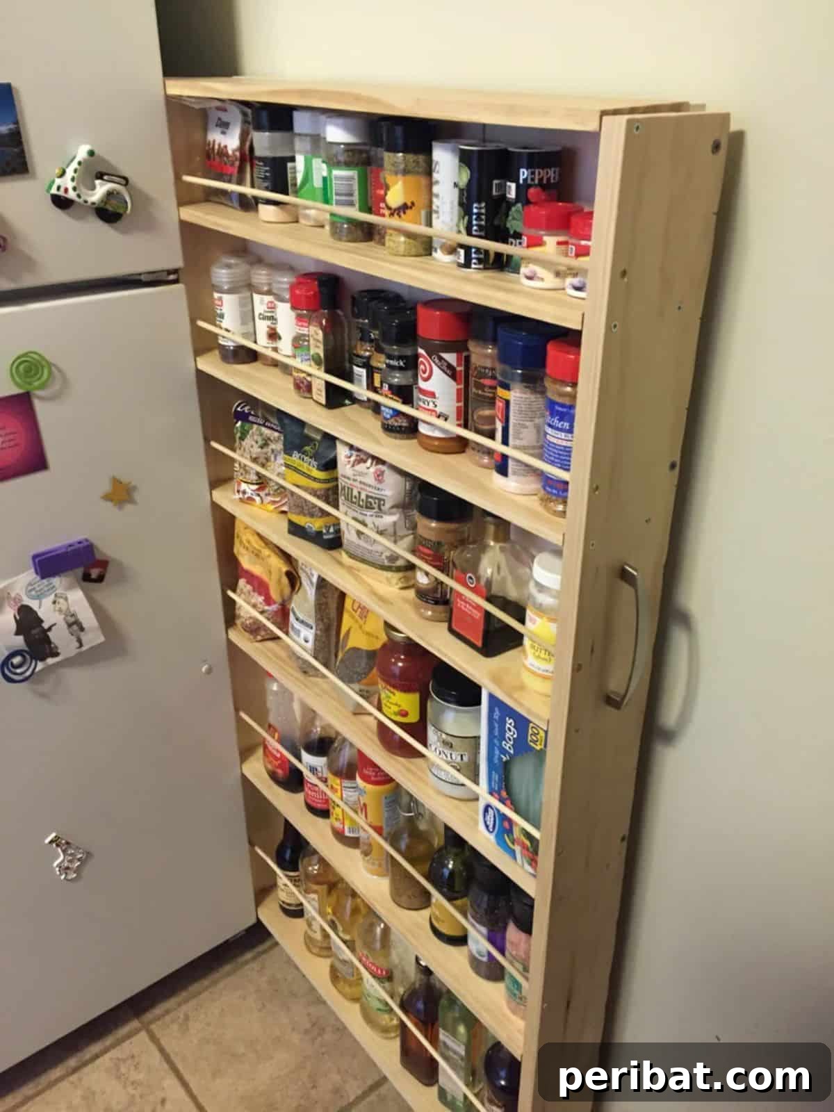 Transform Your Pantry: 45 Shelving Ideas and Creative Builds 36 Hidden Fridge Gap Slide-Out Pantry