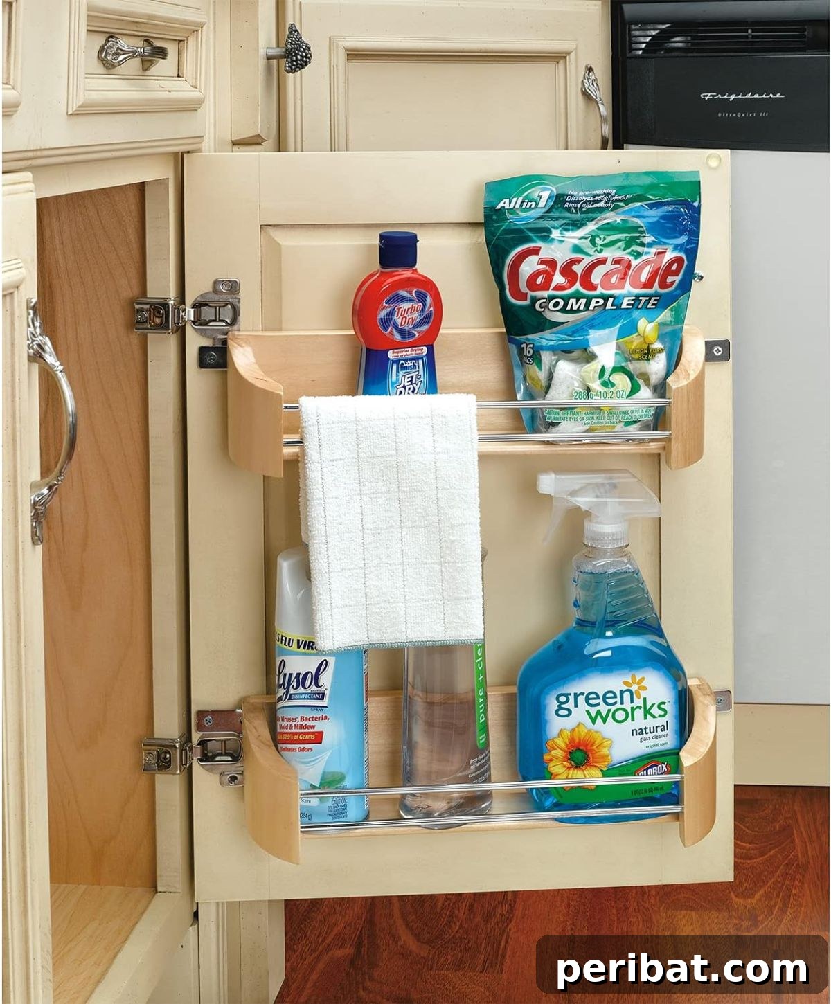 Wooden Cabinet Pantry Door with small shelf or towel bar for hidden storage of sponges and drain plugs, utilizing overlooked space.