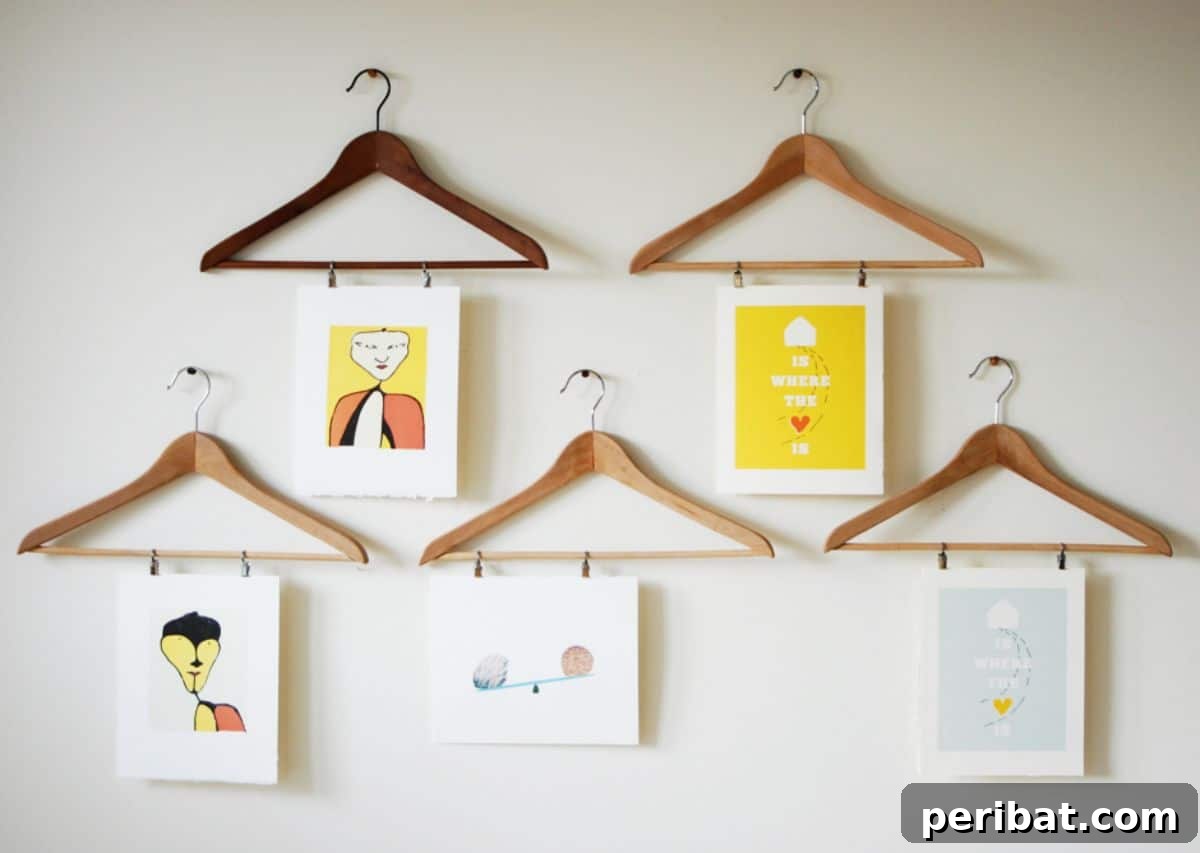 26 Inspiring DIY Photo Collage Ideas & Creations 9 Clothes Hanger photo collage.