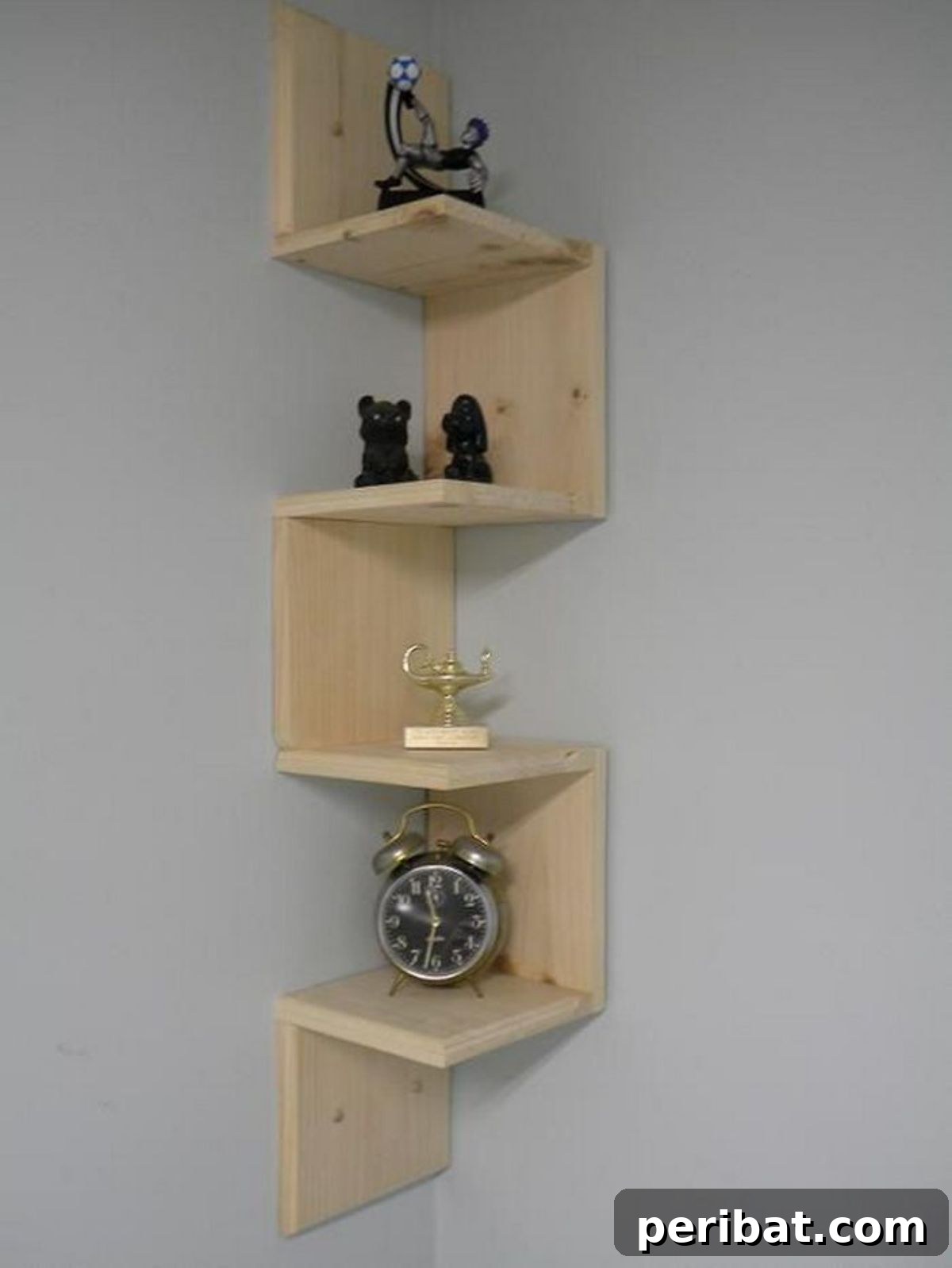 Decorative zig-zag bookshelf storing books and small items, adding visual interest.