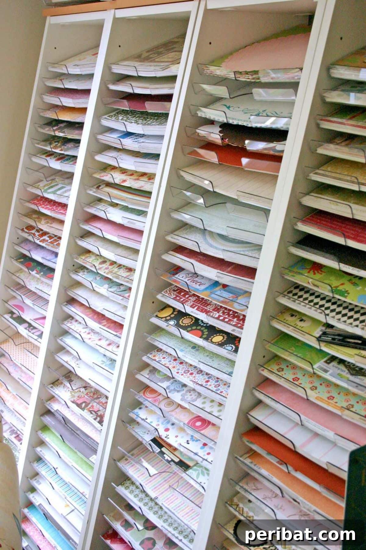 Custom-built wooden stash shelf for organizing craft papers and supplies.