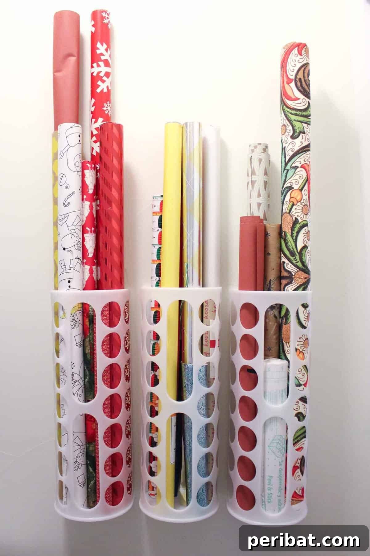 Vertical storage solution for wrapping paper or scrapbook paper, utilizing wall space.