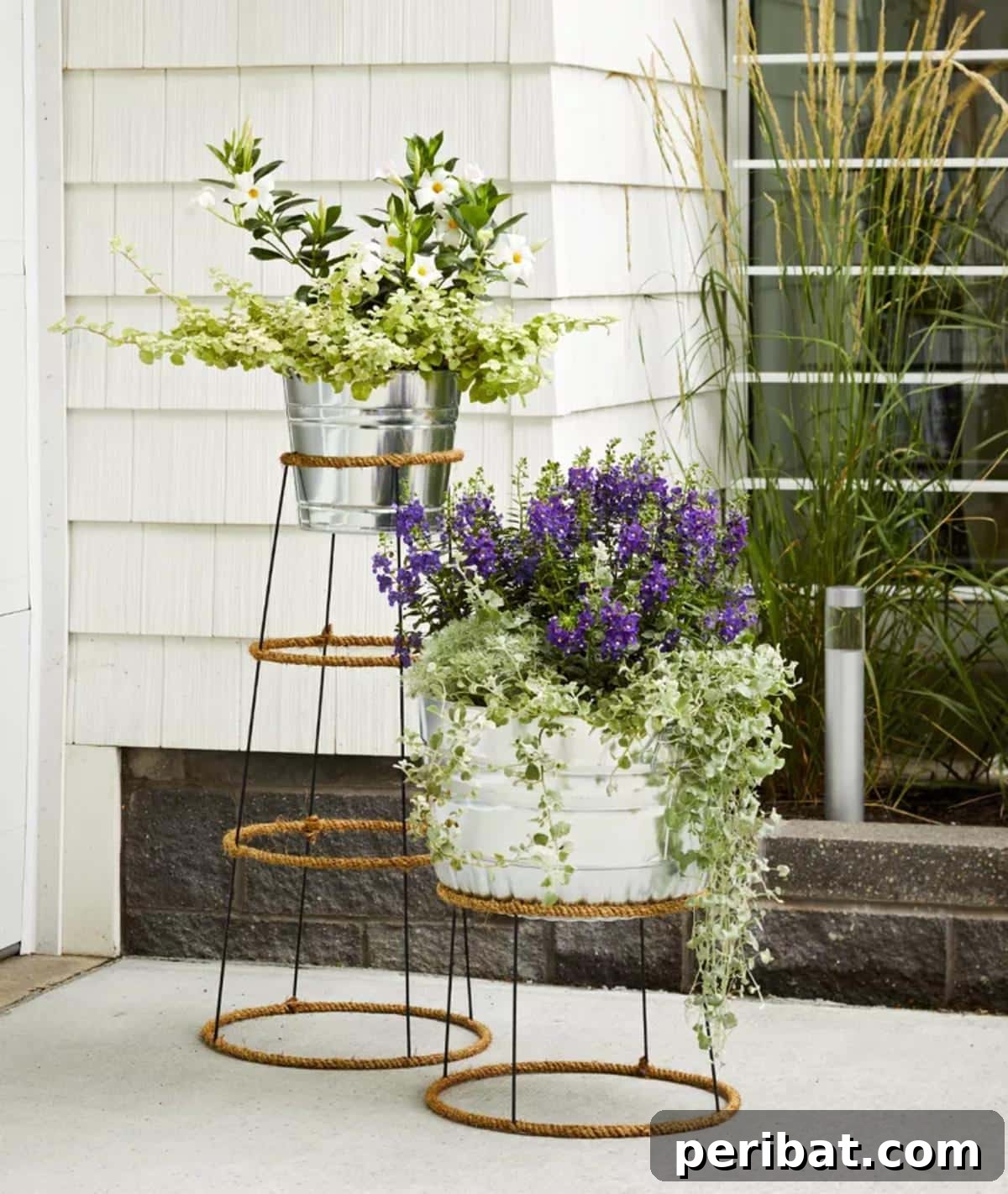 50 Plant Display Ideas: DIY Projects and Product Picks 29 Repurposed tomato cage plant stands displaying potted plants