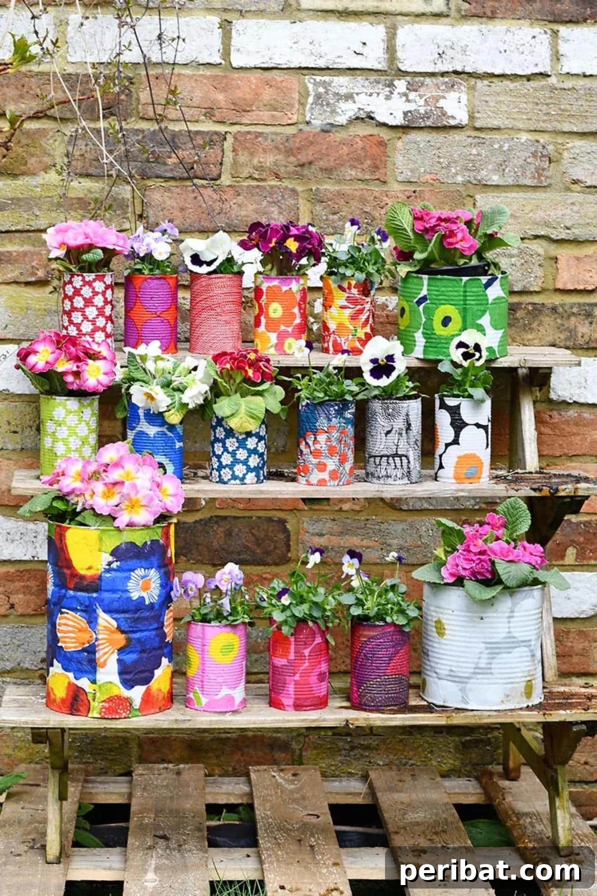 50 Plant Display Ideas: DIY Projects and Product Picks 33 Decorative tin can planters adorned with colorful patterns