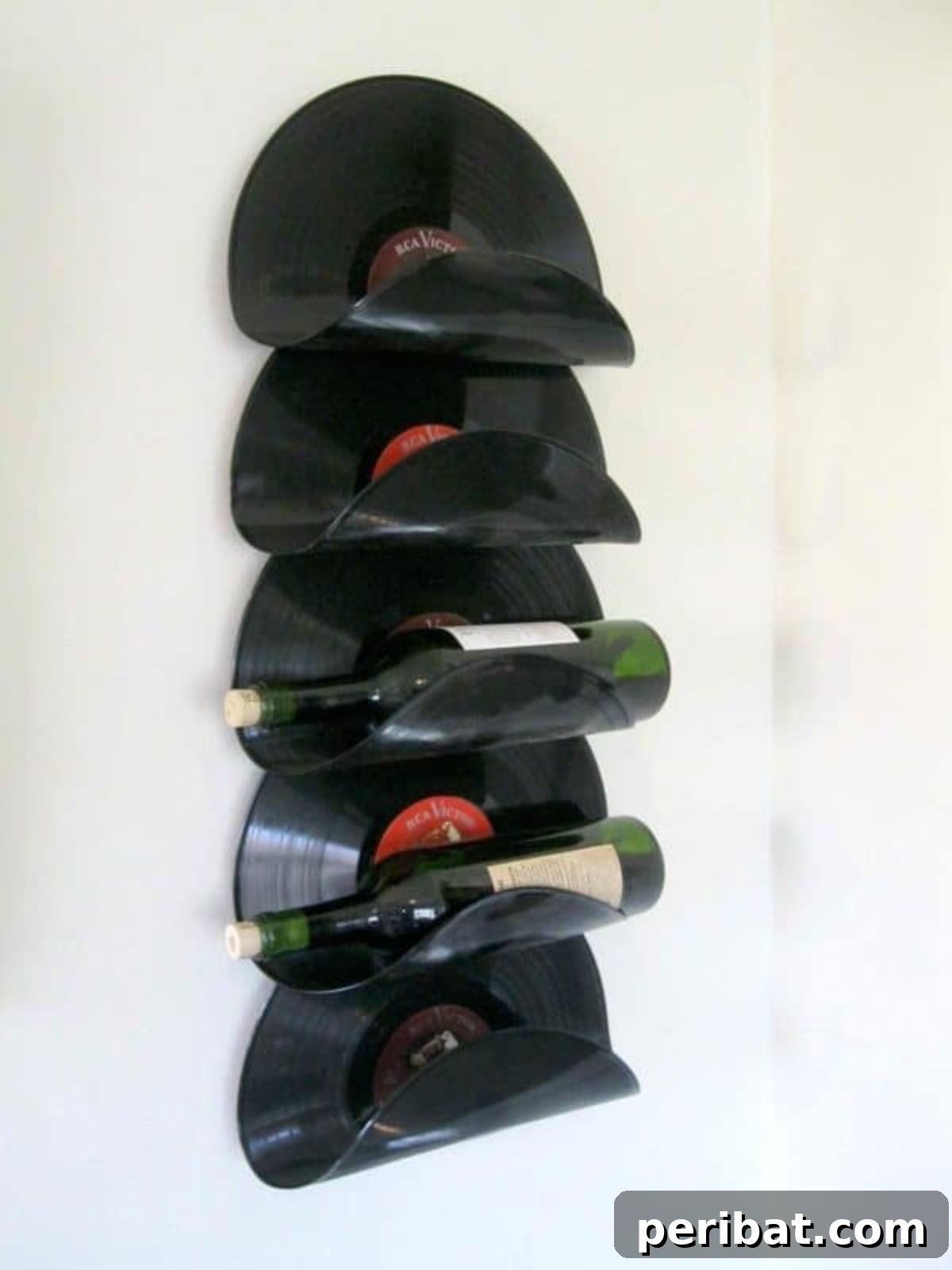 45 Clever DIY Wine Rack Solutions 12 Wine Rack Made From Upcycled Vinyl Records