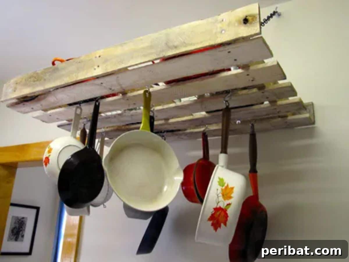 43 Brilliant DIY Pot Rack Projects 13 Creative DIY pallet pot rack for rustic kitchen organization.