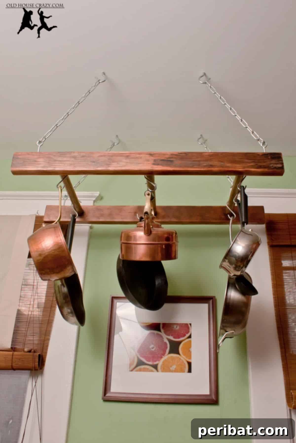 43 Brilliant DIY Pot Rack Projects 14 Unique antique ladder pot rack for vintage kitchen charm.