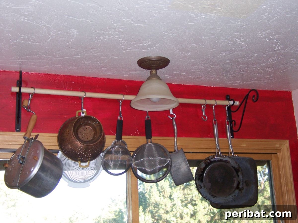 43 Brilliant DIY Pot Rack Projects 15 Budget-friendly and personalized DIY pot rack with dowels and hooks.