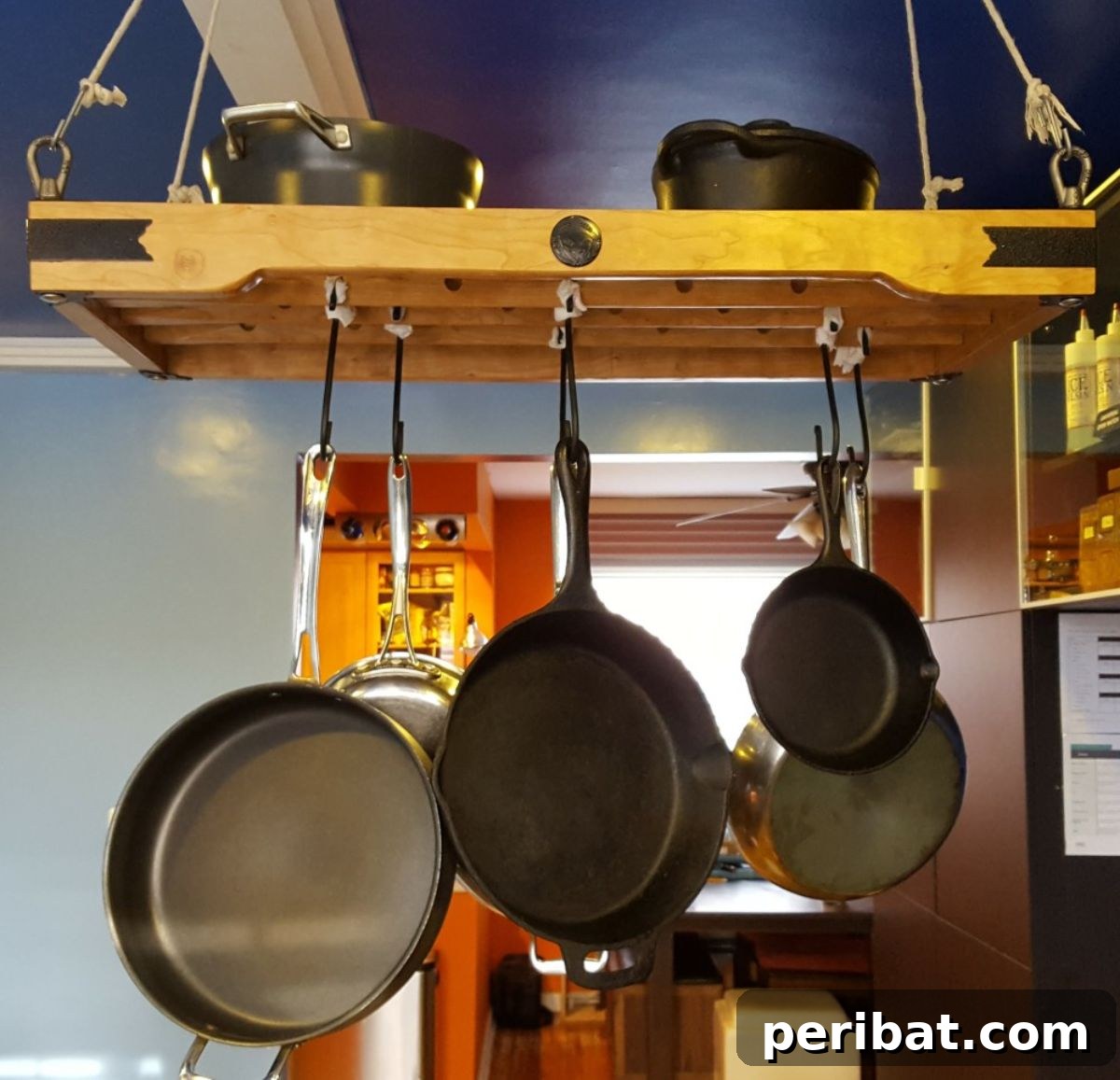 43 Brilliant DIY Pot Rack Projects 16 Gorgeous hanging pot rack for stylish, space-saving kitchen organization.