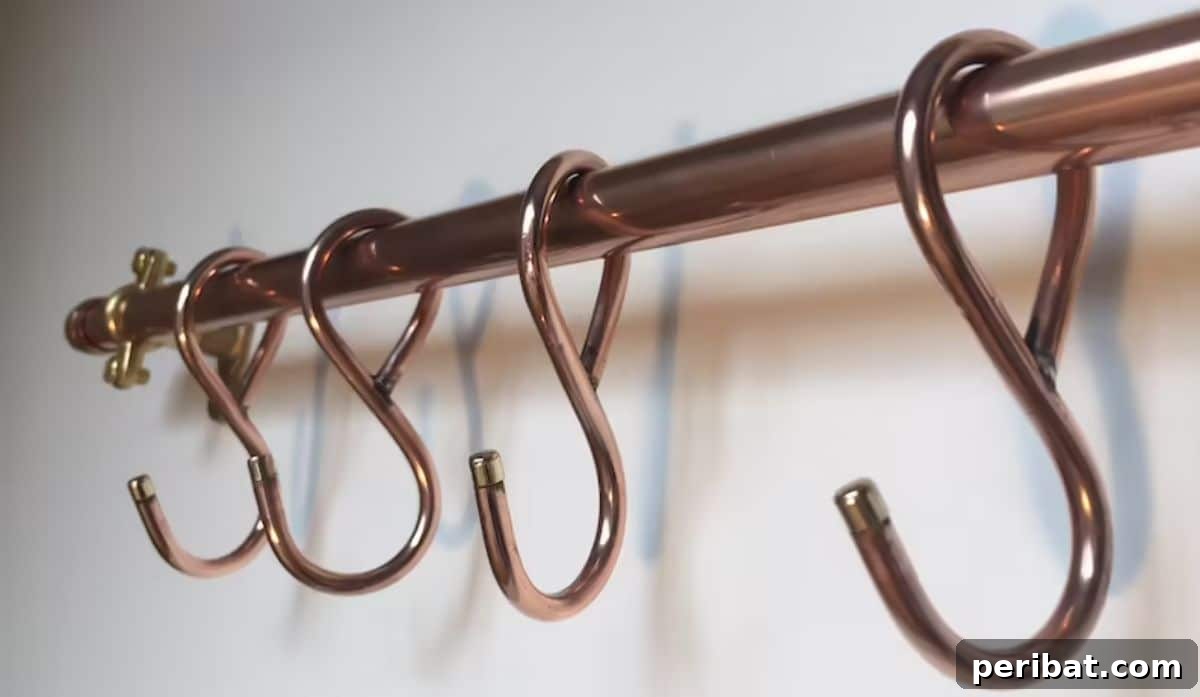 43 Brilliant DIY Pot Rack Projects 35 Stylish pot rack with copper hand-forged rustic French farmhouse butcher hooks.