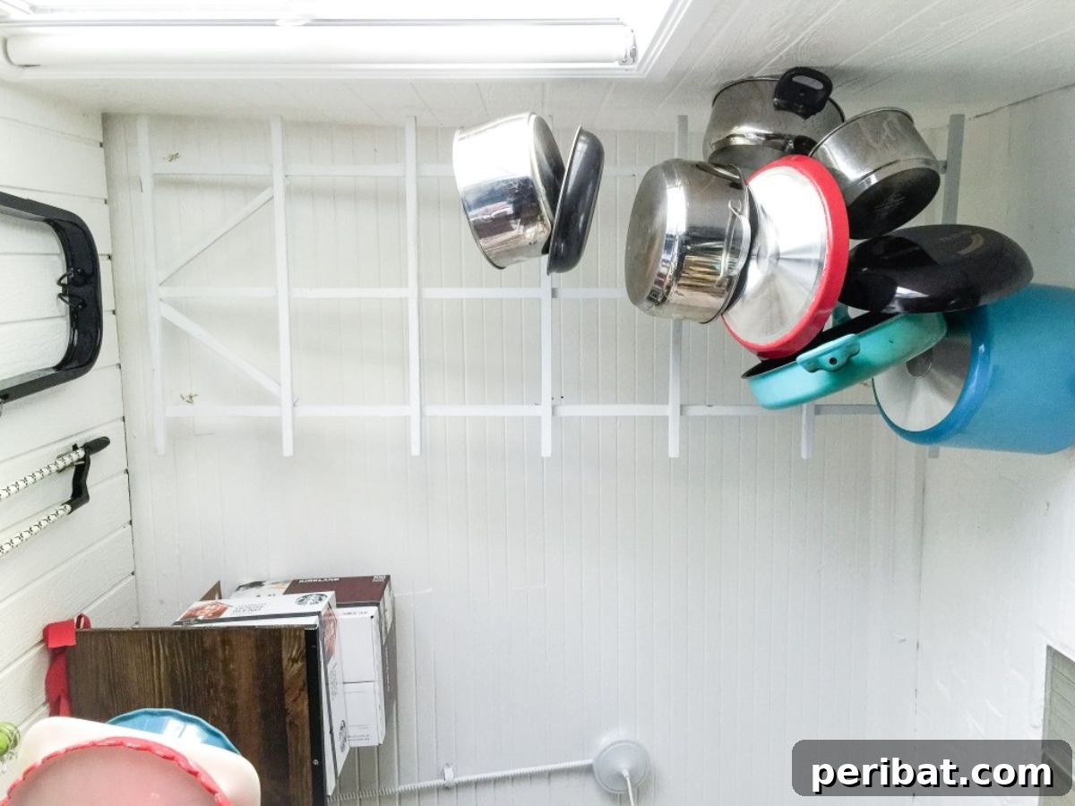 43 Brilliant DIY Pot Rack Projects 38 Clever transformation of a $10 garden trellis into a functional kitchen pot rack.