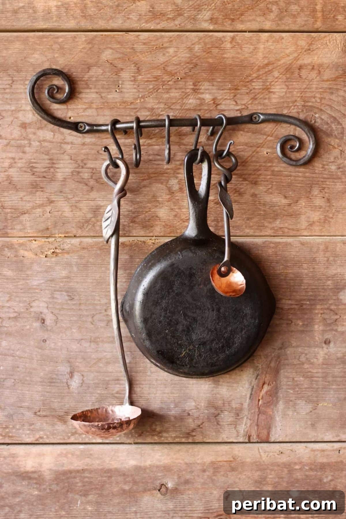 43 Brilliant DIY Pot Rack Projects 41 Unique curly pot and pan holder rack, hand-forged for rustic charm.