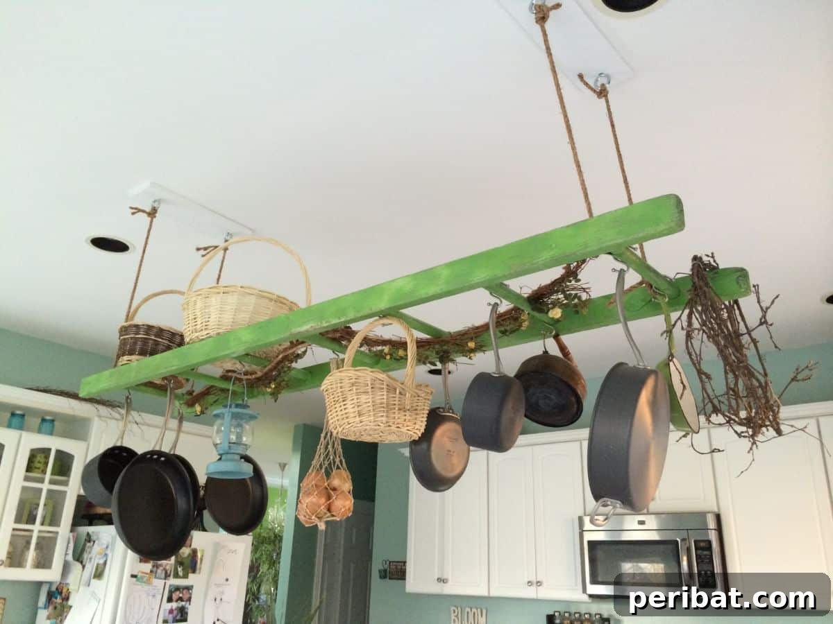 43 Brilliant DIY Pot Rack Projects 42 Rustic hanging ladder pot rack for charming, space-saving kitchen storage.