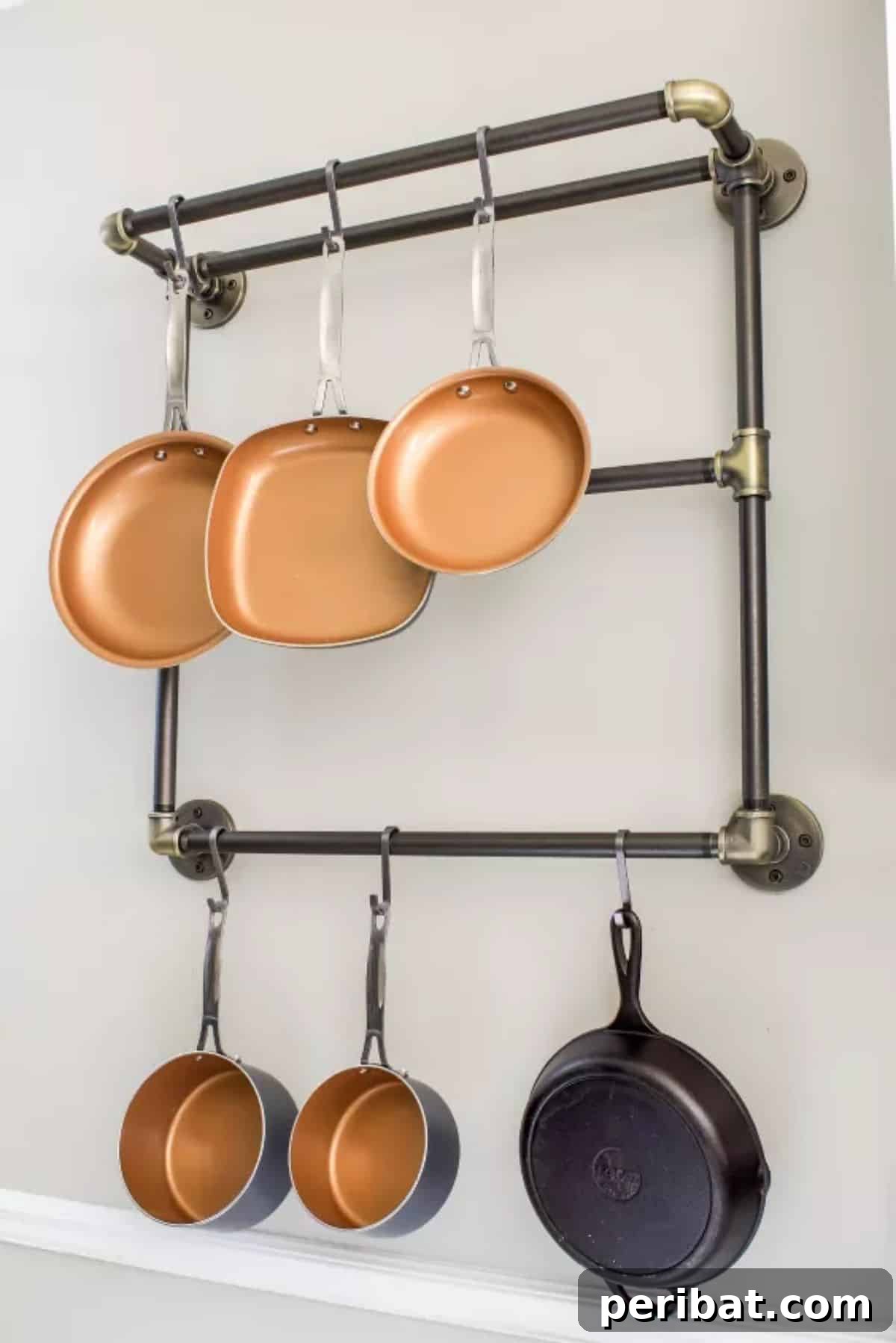 43 Brilliant DIY Pot Rack Projects 6 Easy DIY industrial pot rack for a modern kitchen.