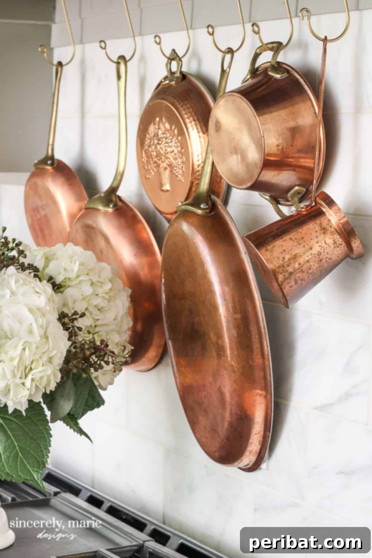 43 Brilliant DIY Pot Rack Projects 9 Elegant tension rod pot rack for vintage cookware.