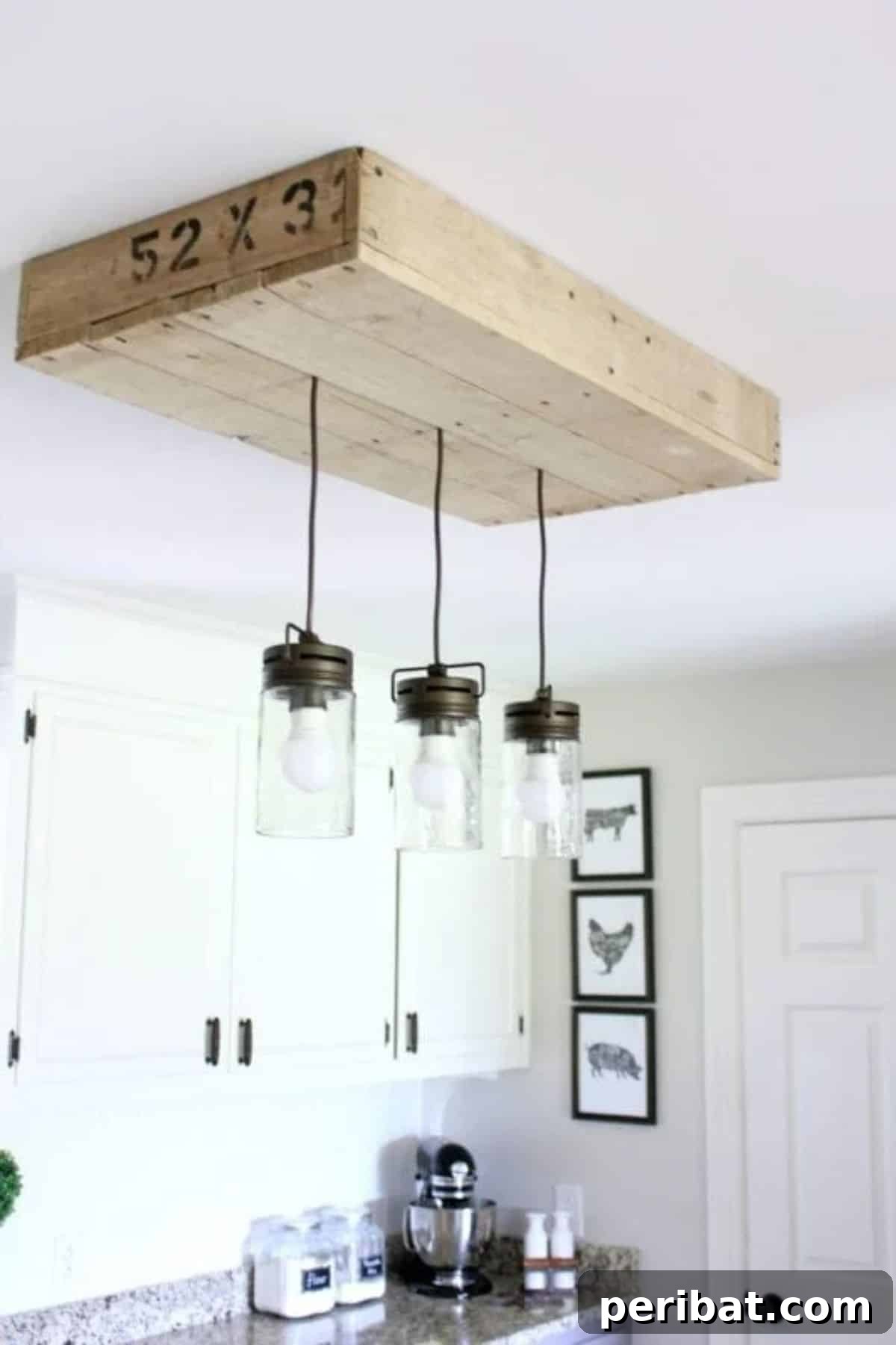 Rustic pallet wood light box with mason jars for charming indoor lighting.