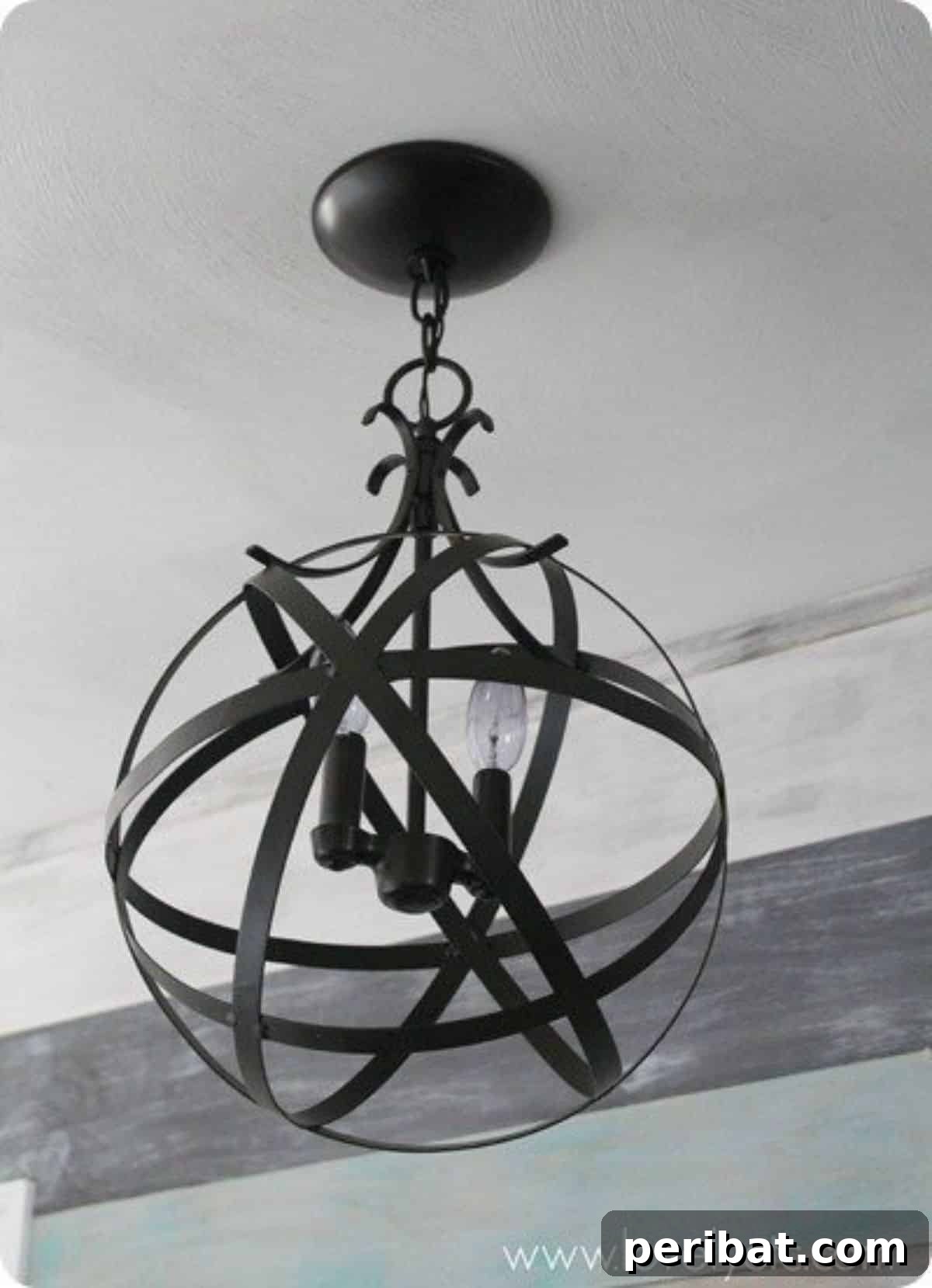 Stylish and budget-friendly DIY orb chandelier for indoor lighting.