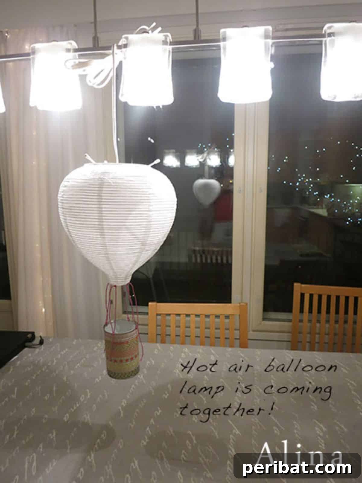 Whimsical DIY hot air balloon lamp for unique indoor decor.